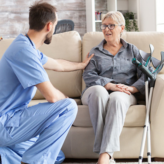 caretaker checking on patient